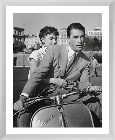 AUDREY HEPBURN AND GREGORY PECK BLACK AND WHITE FRAMED WALL ART (20 X 16")